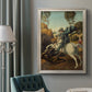 Religious painting of Saint George slaying the dragon by Raphael in an ornate champagne frame displayed in a neutral interior setting.