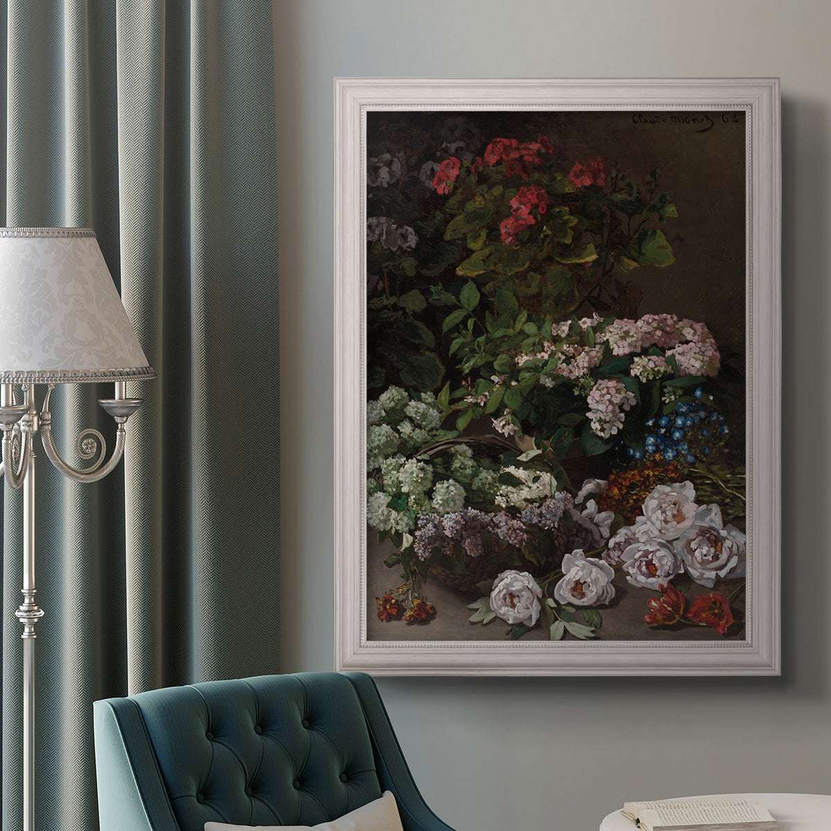 Early impressionist floral painting by Claude Monet in an ornate weathered white frame displayed in a neutral interior setting.