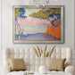 Pointillist coastal seascape by Paul Signac in an ornate champagne frame displayed in a neutral-toned interior setting.