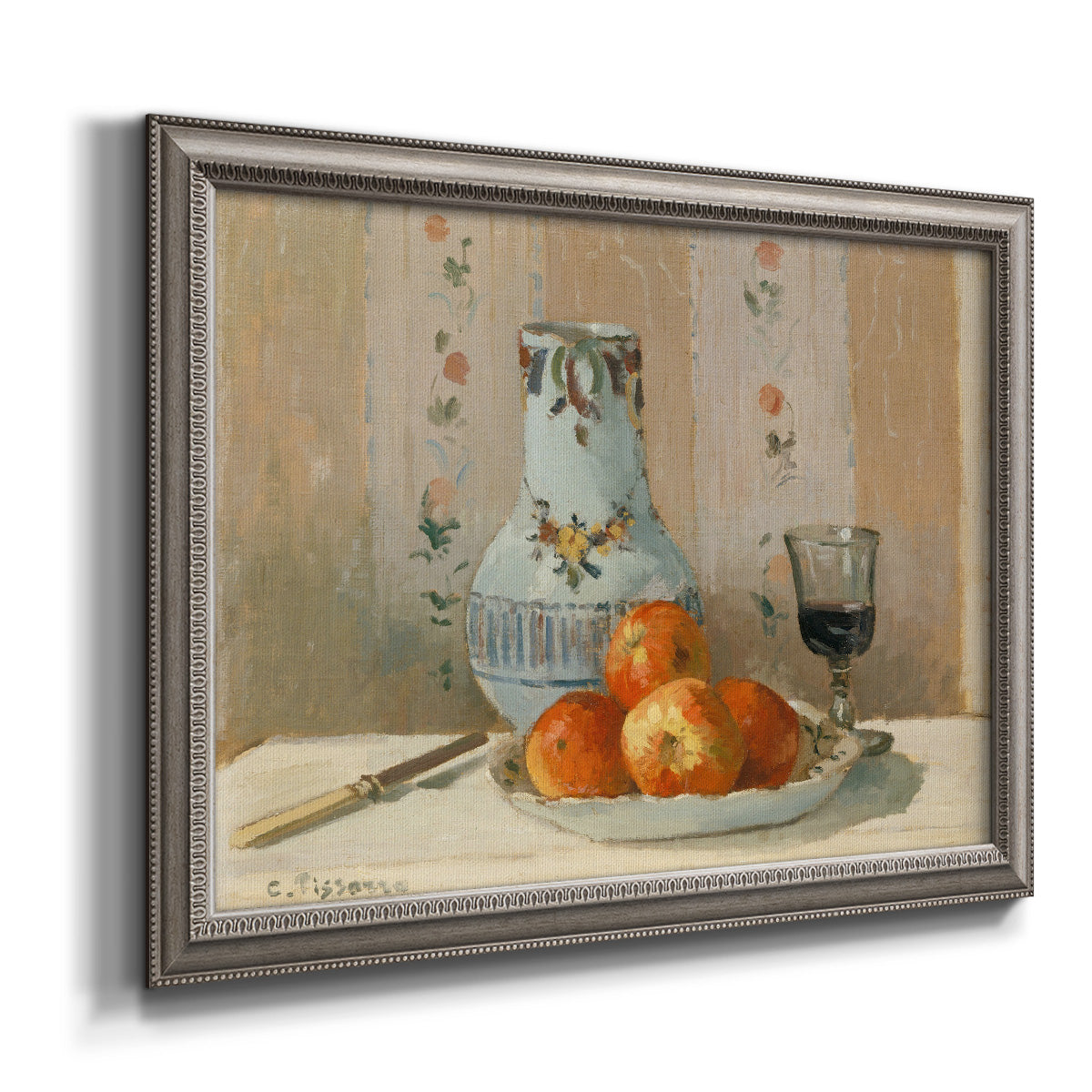 Impressionist still life painting with apples and a ceramic pitcher printed on canvas in an ornate vintage silver frame.