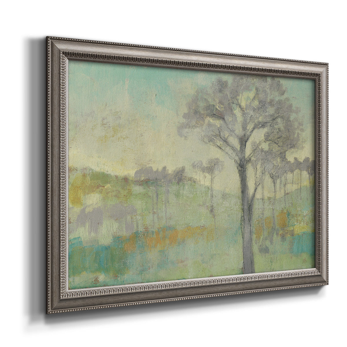 Classical watercolor landscape with trees printed on canvas in an ornate vintage silver frame.