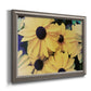 Contemporary black-eyed Susan floral photography printed on canvas in an ornate vintage silver frame.