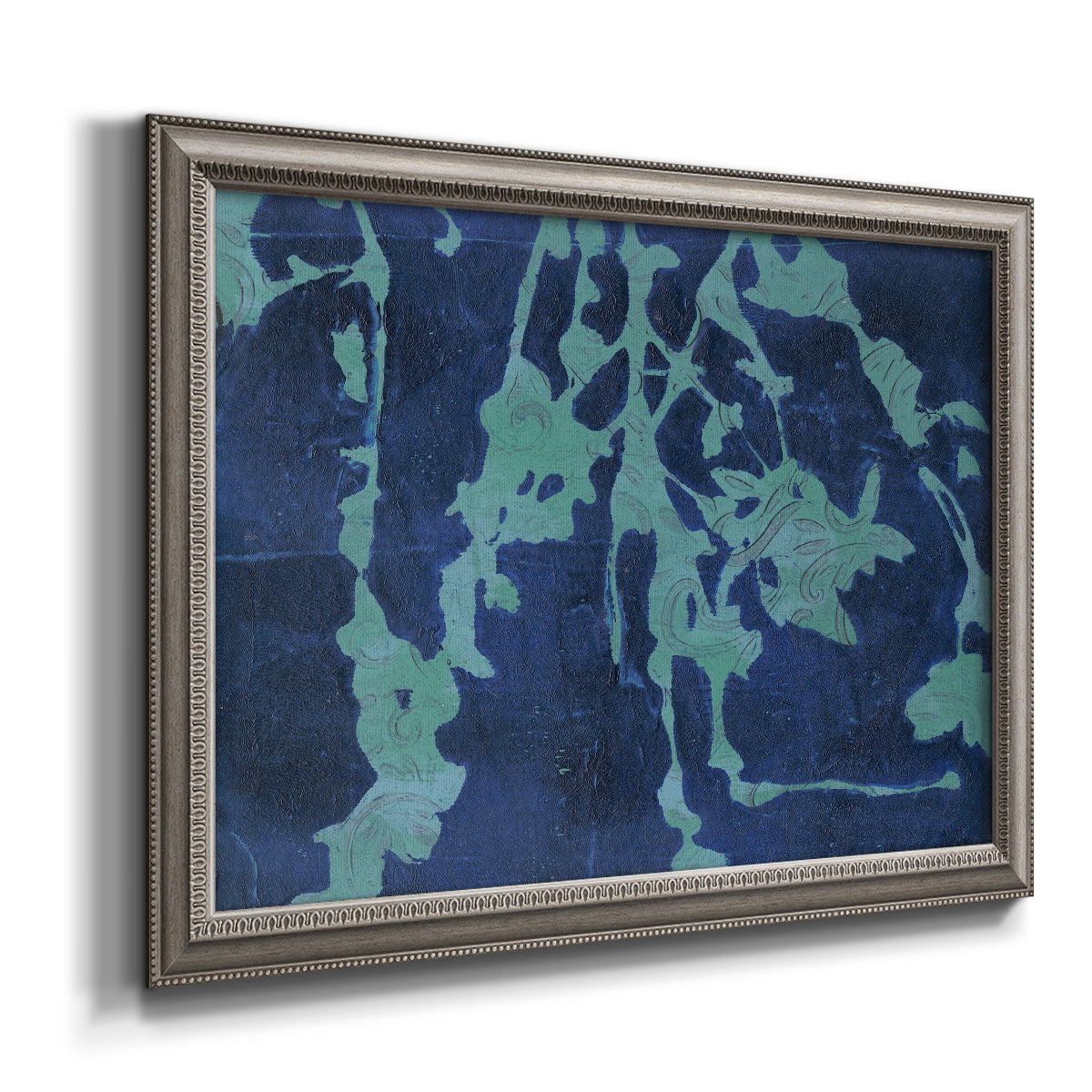 Industrial abstract botanical printed on canvas in an ornate vintage silver frame.