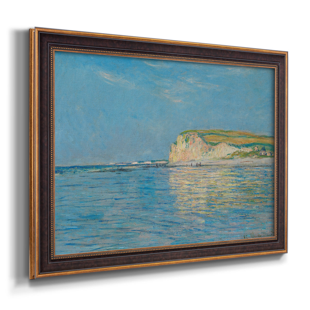 Impressionist coastal low-tide seascape at Pourville by Claude Monet printed on canvas in an ornate bronzed mahogany wood frame.