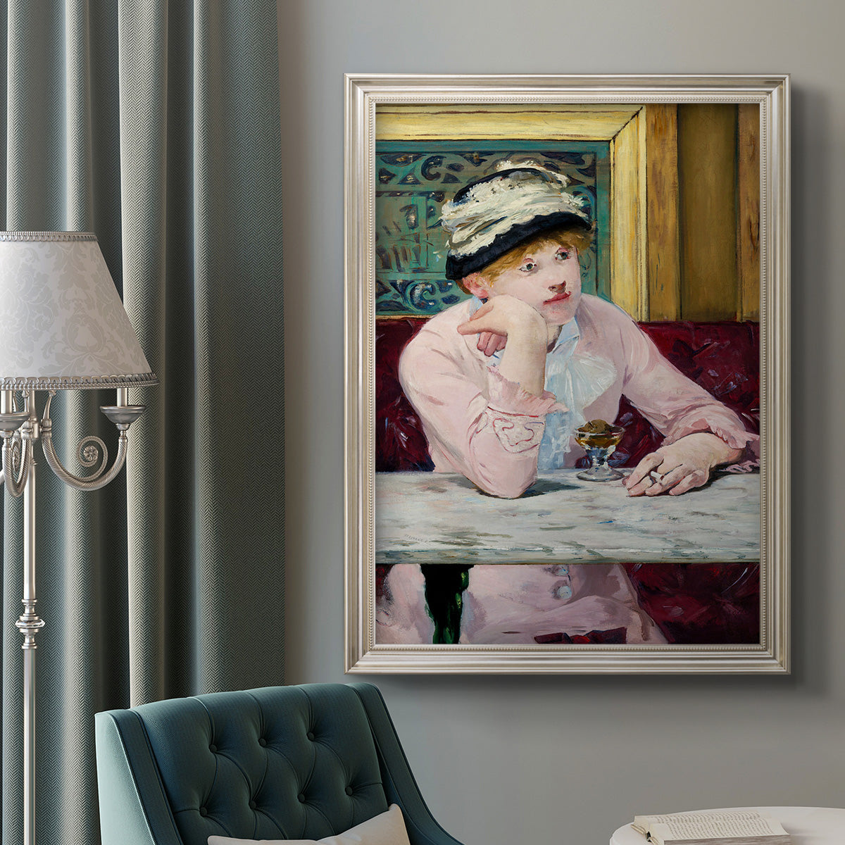 Impressionist portrait scene with plum brandy by Édouard Manet in an ornate champagne frame displayed in a neutral interior setting.
