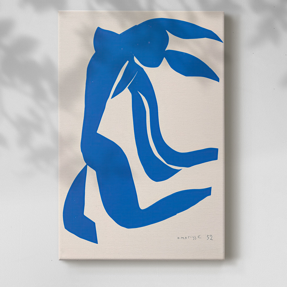 Canvas art print of a stylized figure with simplified lines and vivid color blocks with a soft shadow on a white background.