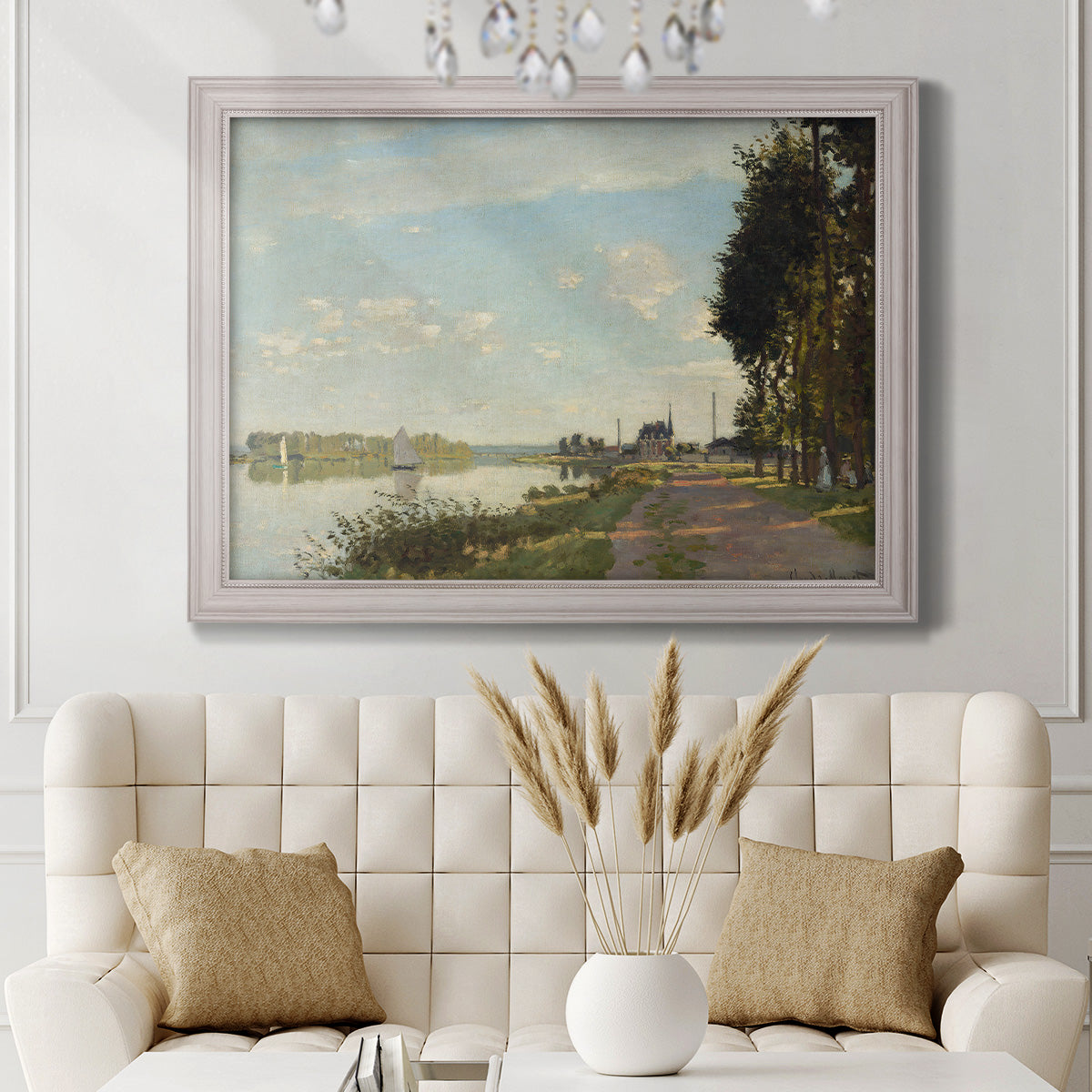 Impressionist river scene with red boats by Claude Monet in an ornate weathered white frame displayed in a neutral-toned interior setting.