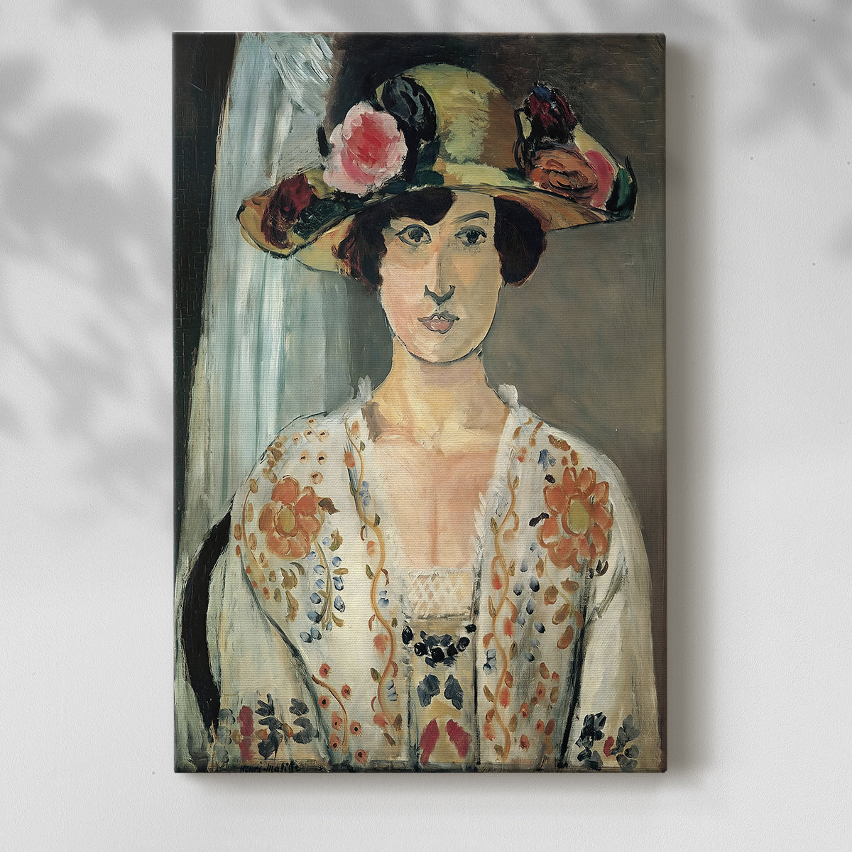 Canvas art print of a stylized face with vibrant tones and textured brushwork with a soft shadow on a white background.