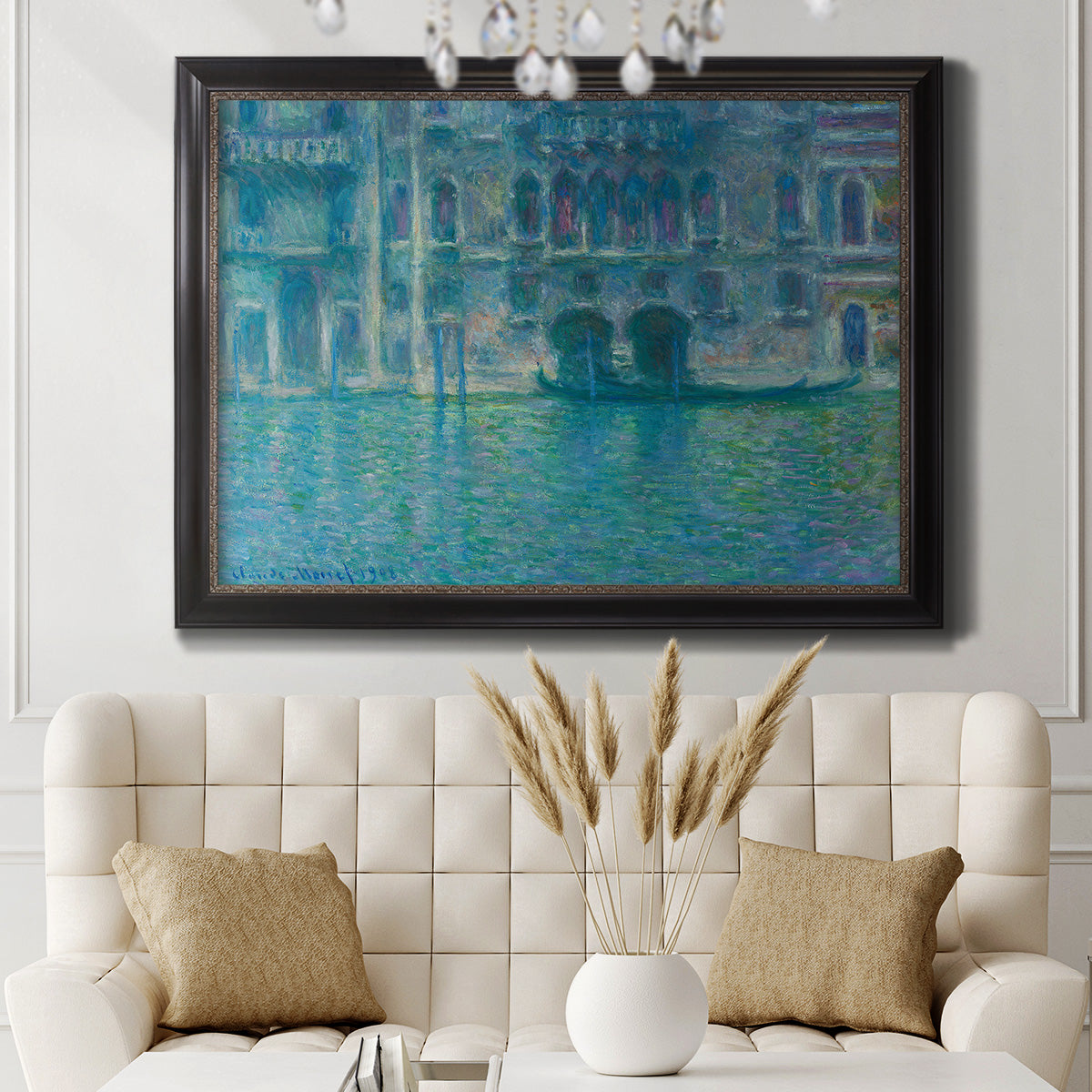 Impressionist Venetian palace waterfront scene by Claude Monet in an ornate black frame with gilded inner detail displayed in a neutral-toned interior setting.