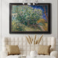 Impressionist lilac flower painting by Vincent van Gogh in an ornate black frame with gilded inner detail displayed in a neutral-toned interior setting.