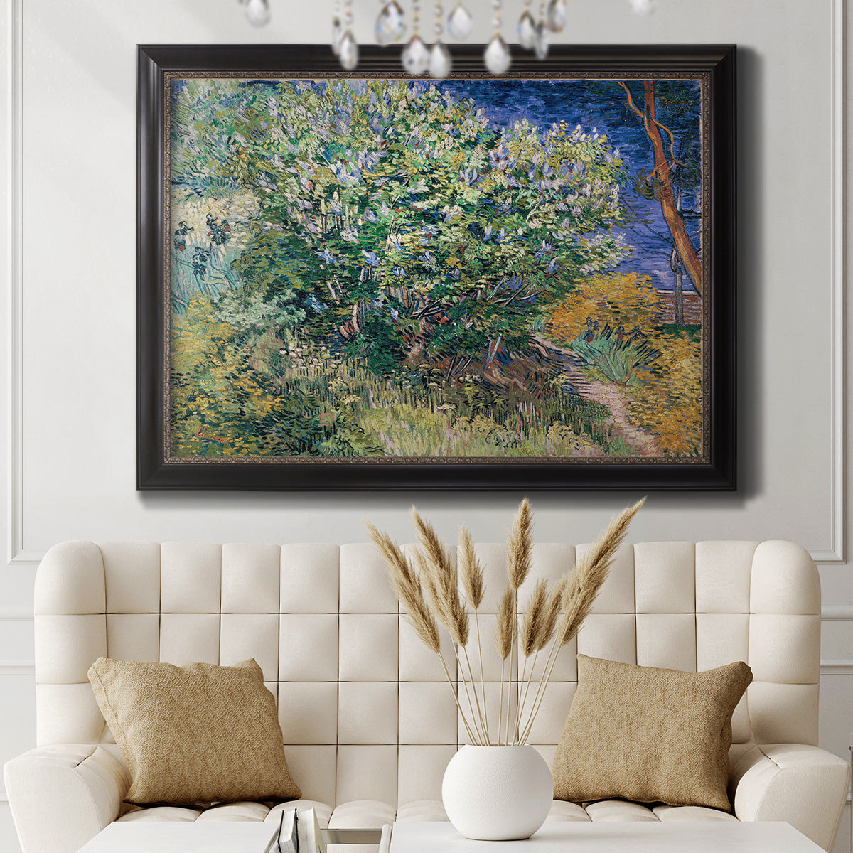 Impressionist lilac flower painting by Vincent van Gogh in an ornate black frame with gilded inner detail displayed in a neutral-toned interior setting.