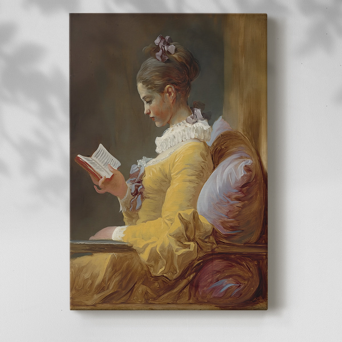 Canvas art print of a calm figure absorbed in a book with delicate shading with a soft shadow on a white background.