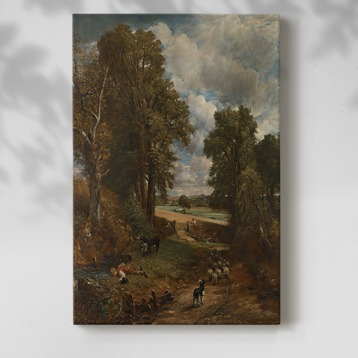 Canvas art print of a countryside scene with path, trees, and open sky with a soft shadow on a white background.