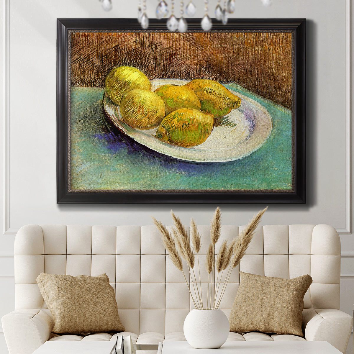Impressionist still life with lemons by Vincent van Gogh in an ornate black frame with gilded inner detail displayed in a neutral-toned interior setting.
