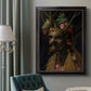 Surreal allegorical portrait representing the four seasons by Giuseppe Arcimboldo in an ornate black frame with gilded inner detail displayed in a neutral interior setting.