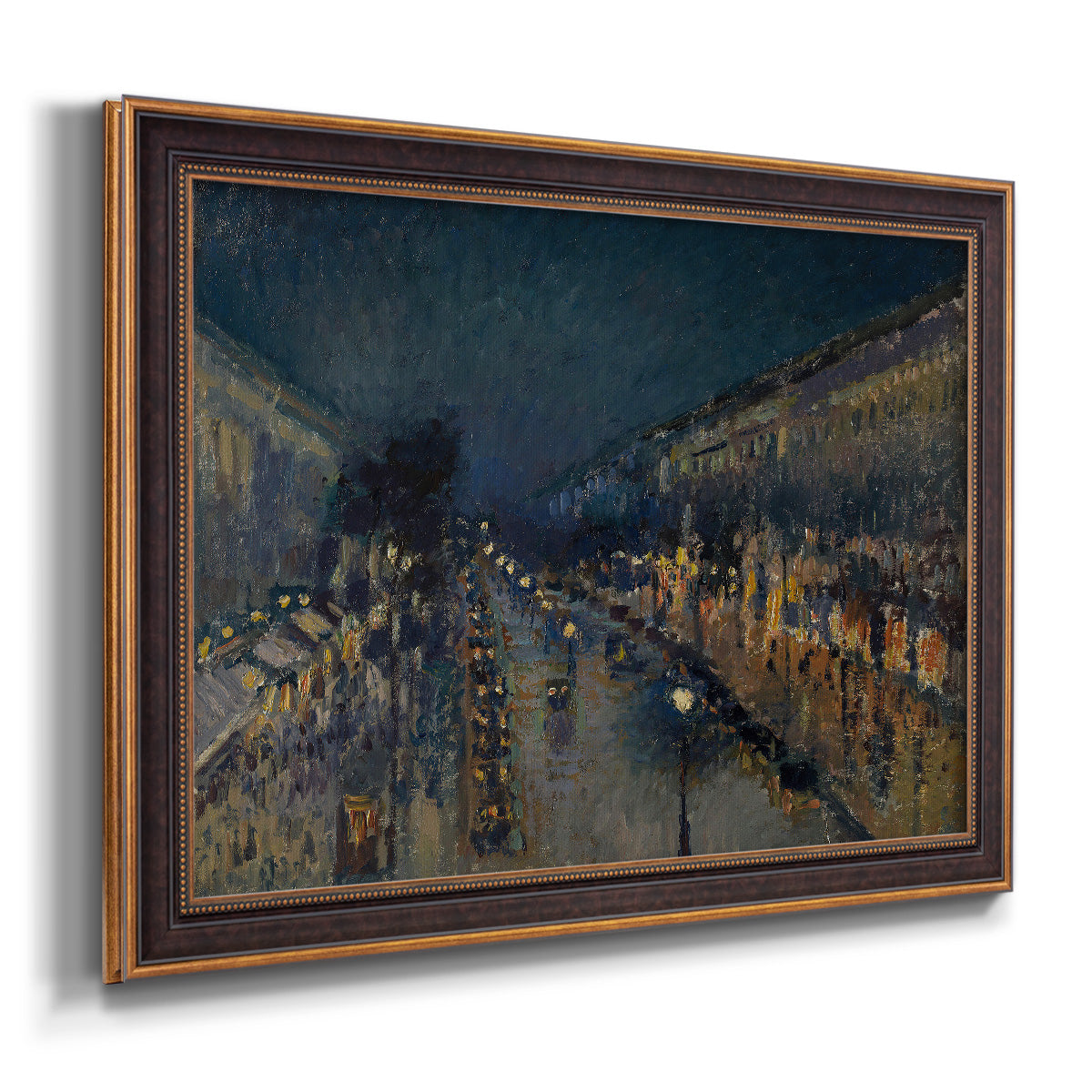 Impressionist nighttime Paris street scene by Camille Pissarro printed on canvas in an ornate bronzed mahogany wood frame.