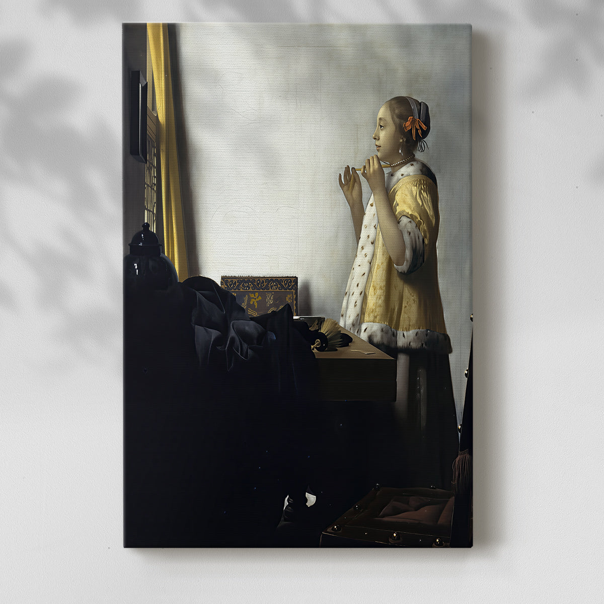 Canvas art print of a refined figure with subtle gesture and calm expression with a soft shadow on a white background.