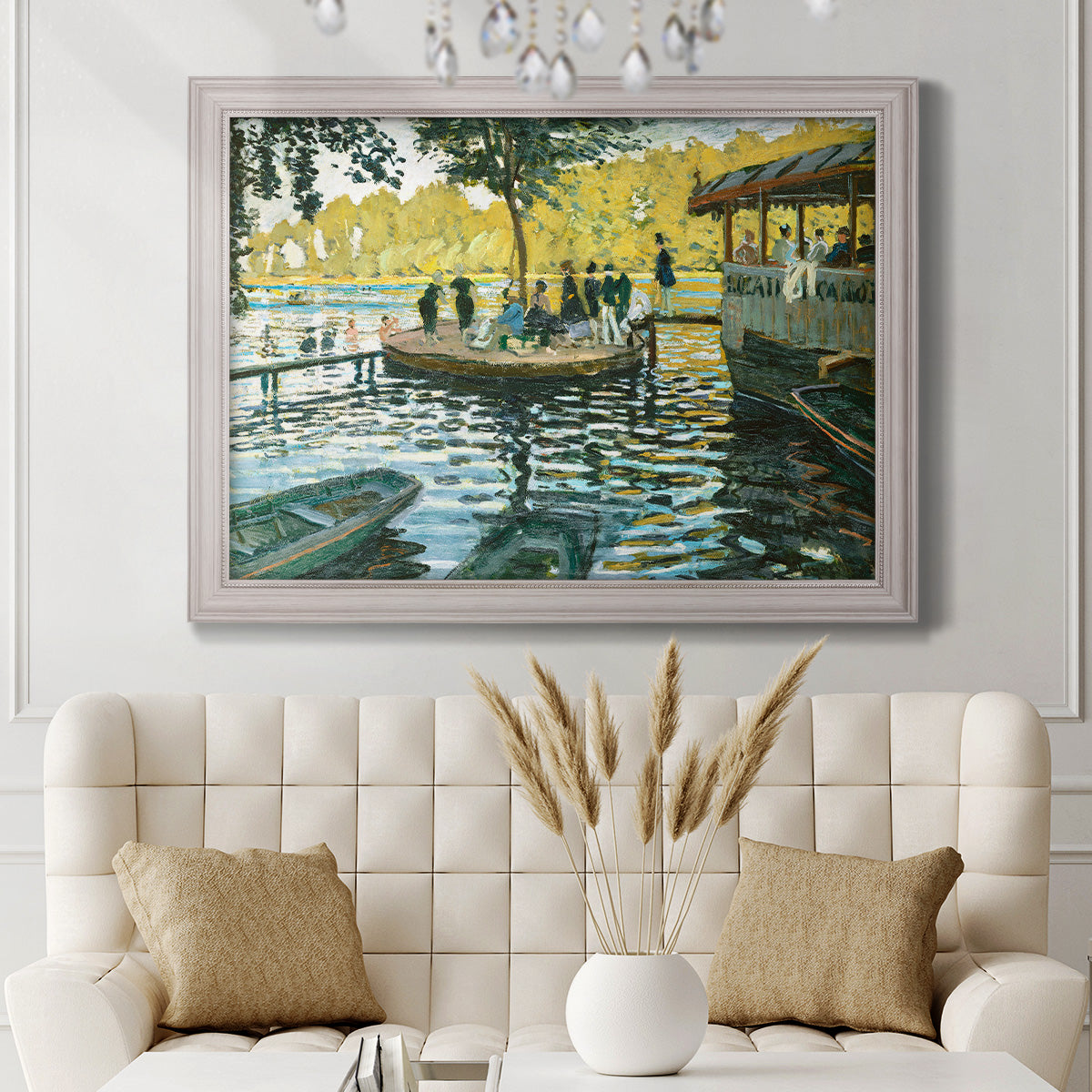 Impressionist riverside leisure scene by Claude Monet in an ornate weathered white frame displayed in a neutral-toned interior setting.