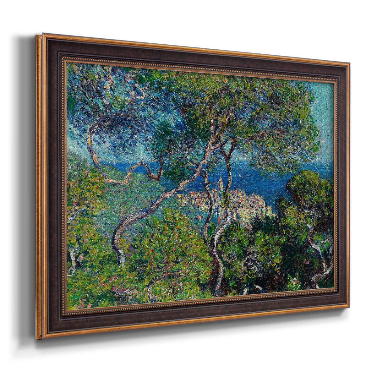 Impressionist Mediterranean coastal landscape by Claude Monet printed on canvas in an ornate bronzed mahogany wood frame.