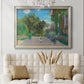 Impressionist residential landscape at Argenteuil by Claude Monet in an ornate champagne frame displayed in a neutral-toned interior setting.