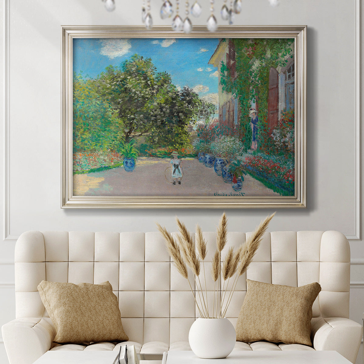 Impressionist residential landscape at Argenteuil by Claude Monet in an ornate champagne frame displayed in a neutral-toned interior setting.