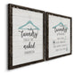 Angled view of a set of two black barnwood framed canvas prints featuring two rustic typographic wall art featuring humorous laundry-room sayings and clothing icons.
