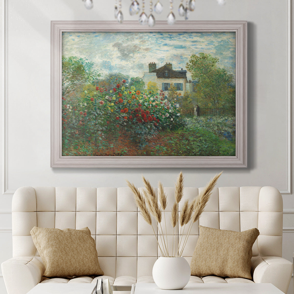 Impressionist garden landscape at Argenteuil by Claude Monet in an ornate weathered white frame displayed in a neutral-toned interior setting.