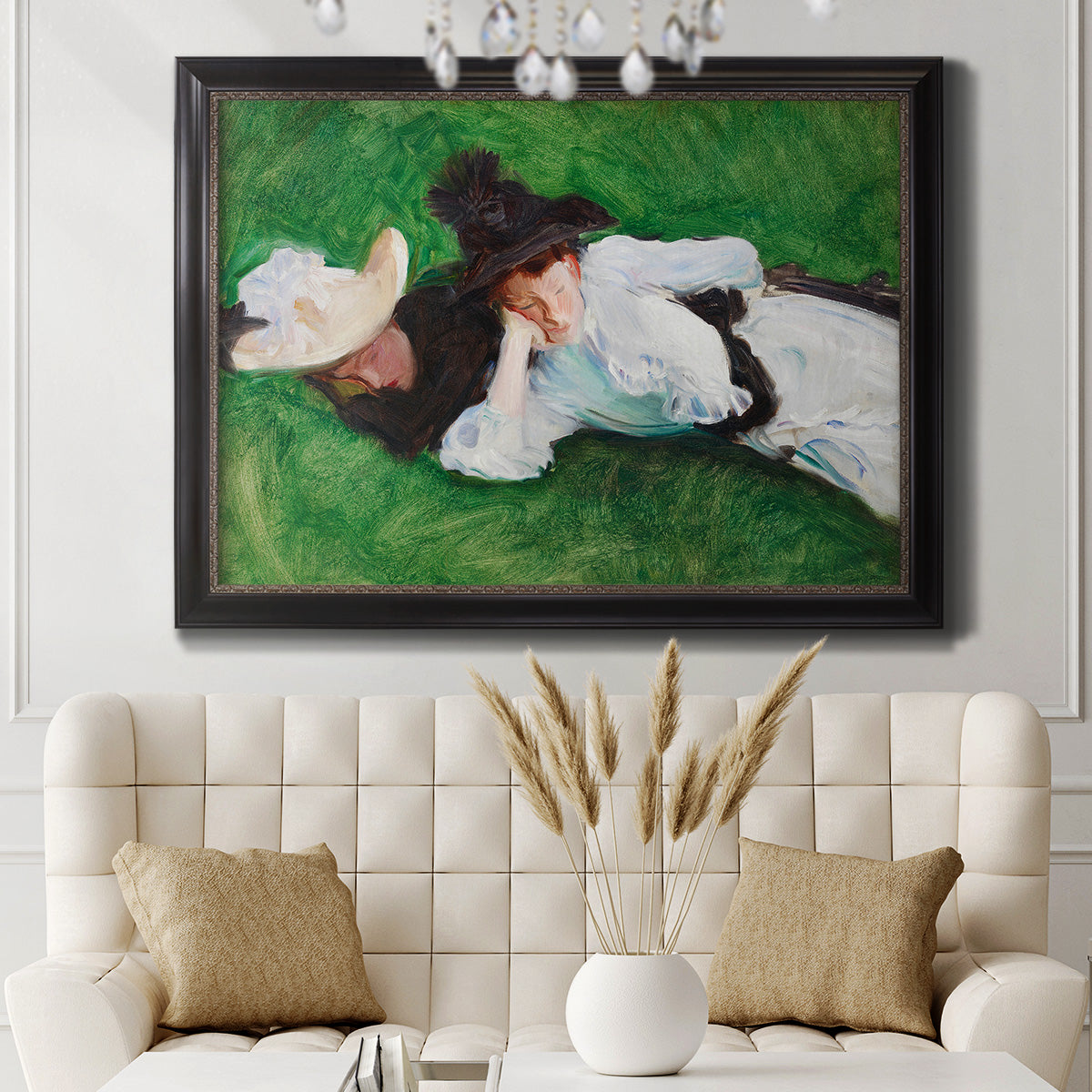Impressionist outdoor portrait of two girls by John Singer Sargent in an ornate black frame with gilded inner detail displayed in a neutral-toned interior setting.