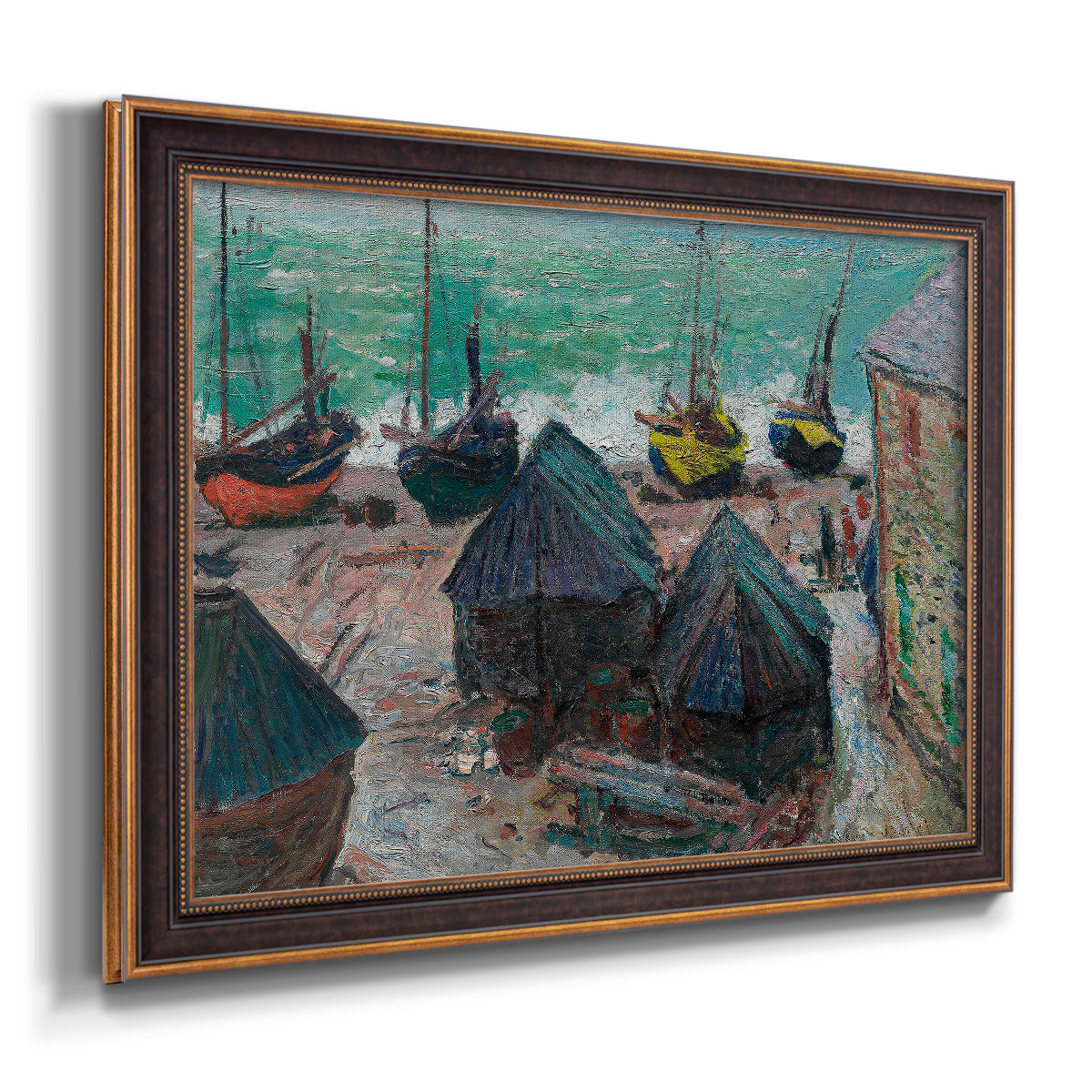 Impressionist coastal beach scene with boats by Claude Monet printed on canvas in an ornate bronzed mahogany wood frame.
