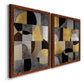 Angled view of a set of two maple barnwood framed canvas prints featuring two structured modern abstracts featuring interlocking black gray cream and gold geometric sections.