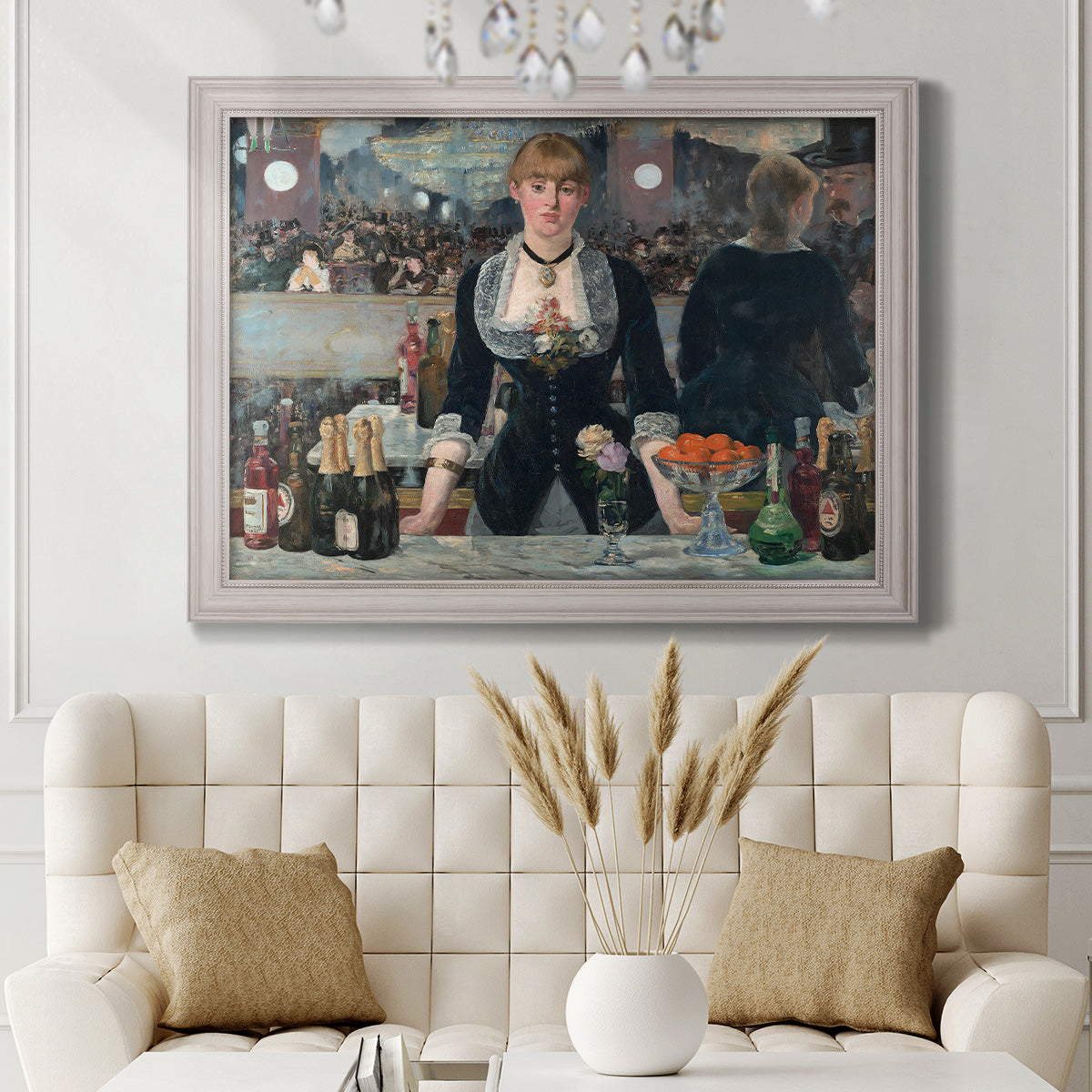 Iconic impressionist café bar scene by Édouard Manet in an ornate weathered white frame displayed in a neutral-toned interior setting.