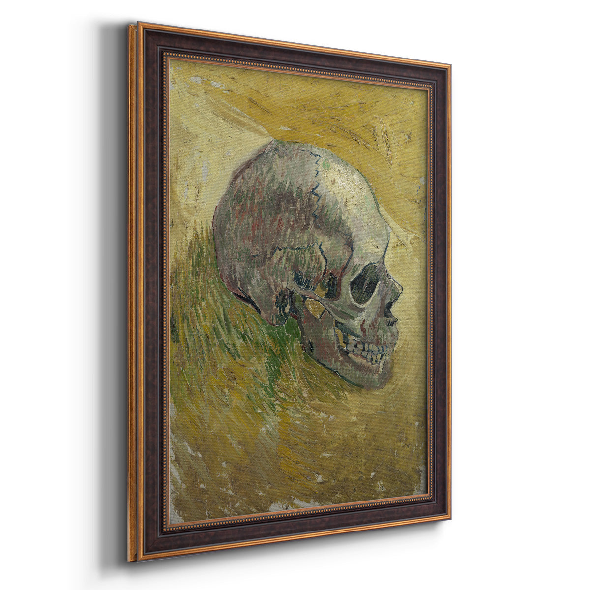 Profile skull study artwork by Vincent van Gogh printed on canvas in an ornate bronzed mahogany wood frame with a vertical orientation.