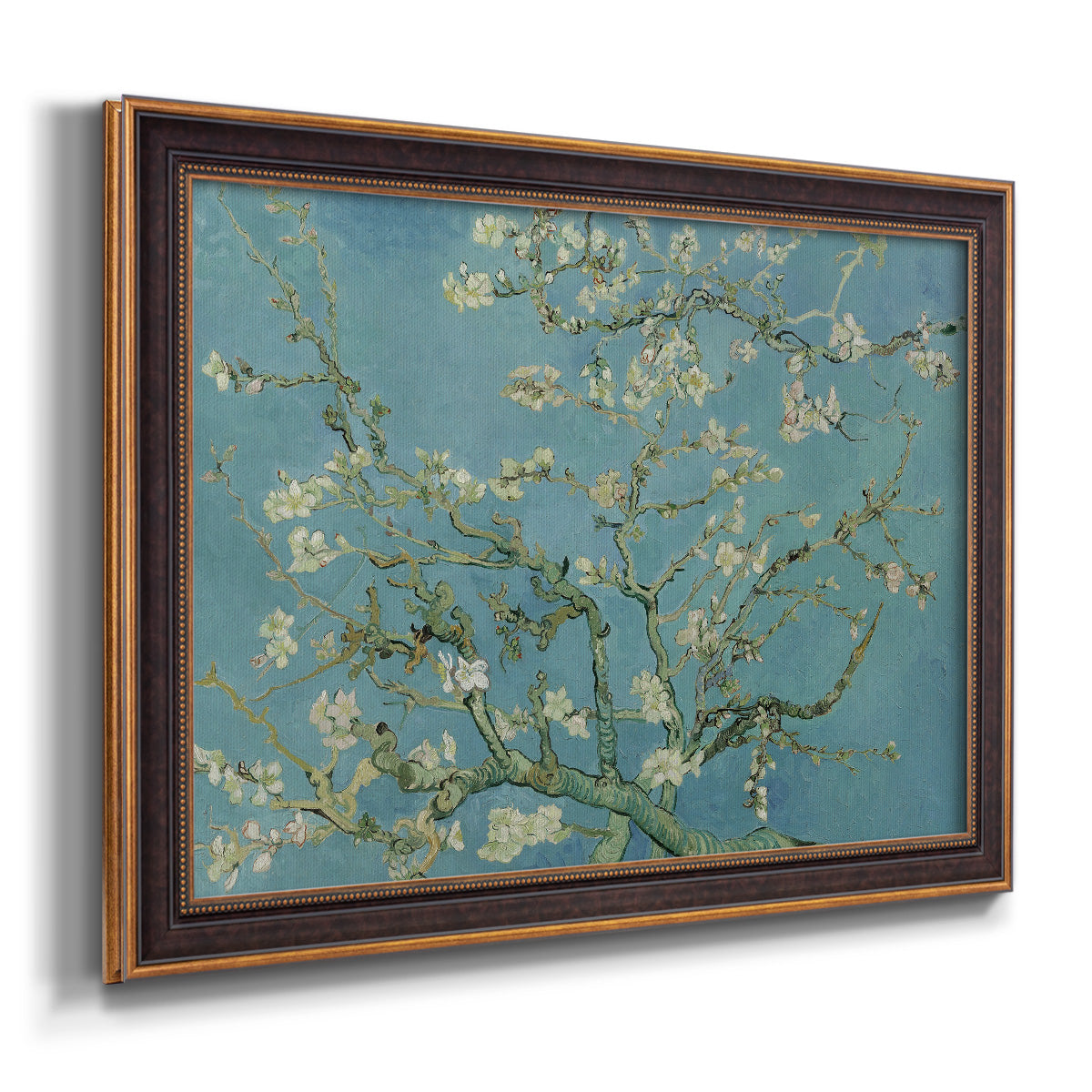 Impressionist flowering almond branch painting by Vincent van Gogh printed on canvas in an ornate bronzed mahogany wood frame.