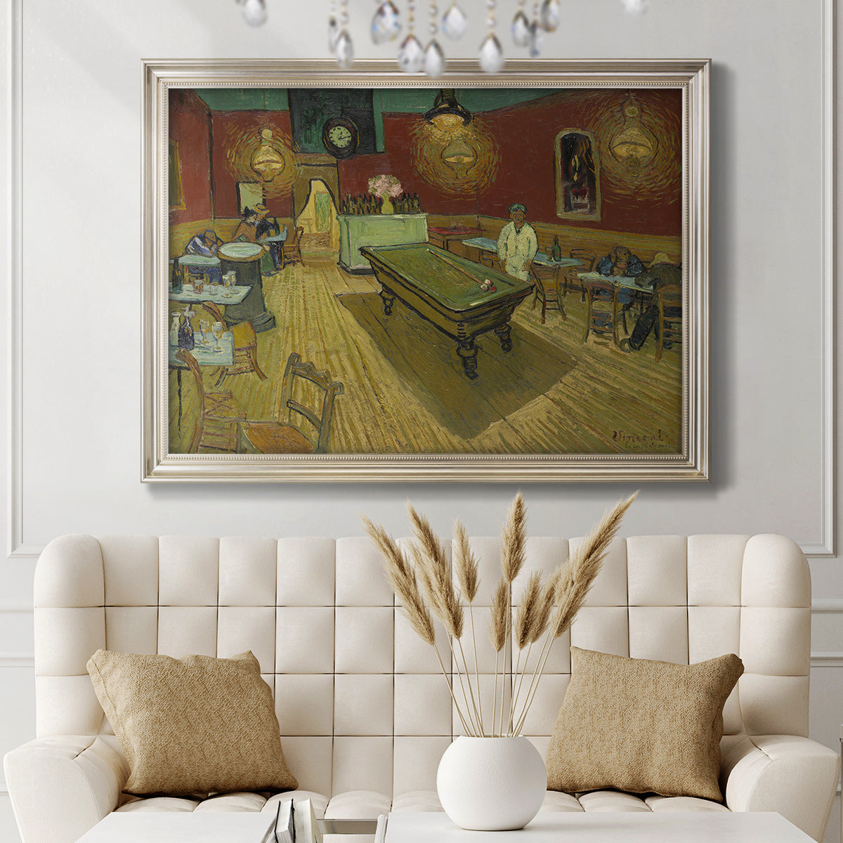 Impressionist interior of a night café by Vincent van Gogh in an ornate champagne frame displayed in a neutral-toned interior setting.