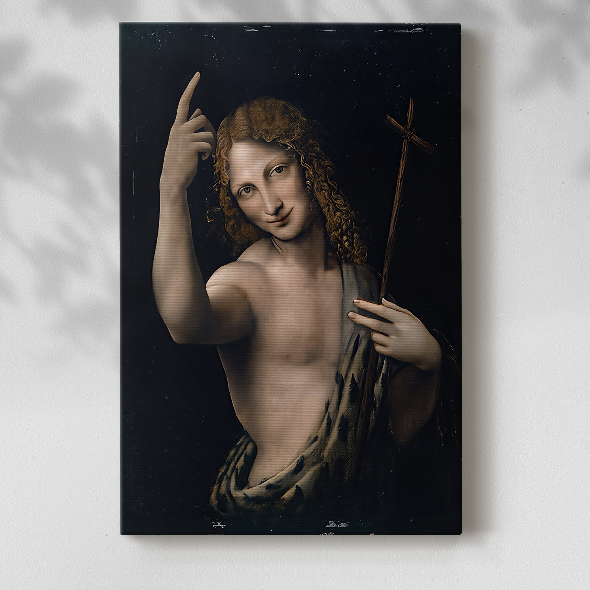 Canvas art print of a dramatic figure with gentle highlights and dark background with a soft shadow on a white background.