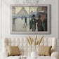 Impressionist urban street scene in the rain by Gustave Caillebotte in an ornate weathered white frame displayed in a neutral-toned interior setting.