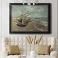 Impressionist coastal fishing boats scene by Vincent van Gogh in an ornate black frame with gilded inner detail displayed in a neutral-toned interior setting.