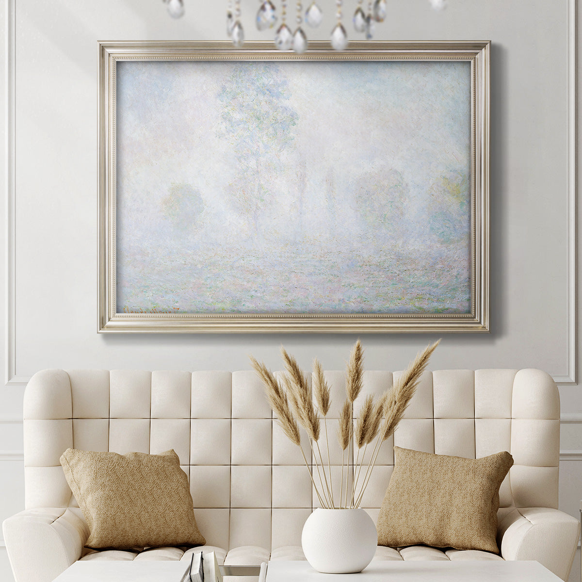 Impressionist atmospheric landscape in morning haze by Claude Monet in an ornate champagne frame displayed in a neutral-toned interior setting.
