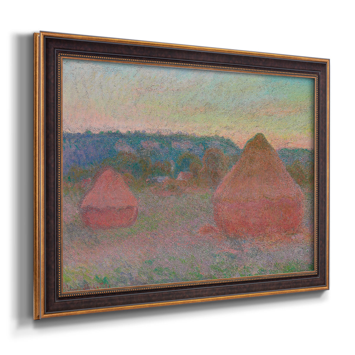 Impressionist haystack series landscape by Claude Monet printed on canvas in an ornate bronzed mahogany wood frame.