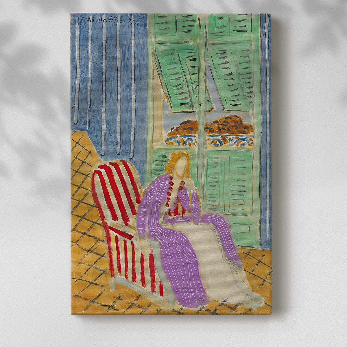 Canvas art print of a stylized figure with bold textile design and rich tones with a soft shadow on a white background.