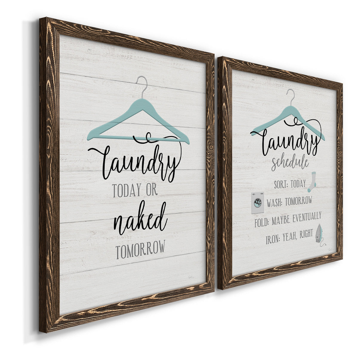 Angled view of a set of two walnut barnwood framed canvas prints featuring two rustic typographic wall art featuring humorous laundry-room sayings and clothing icons.