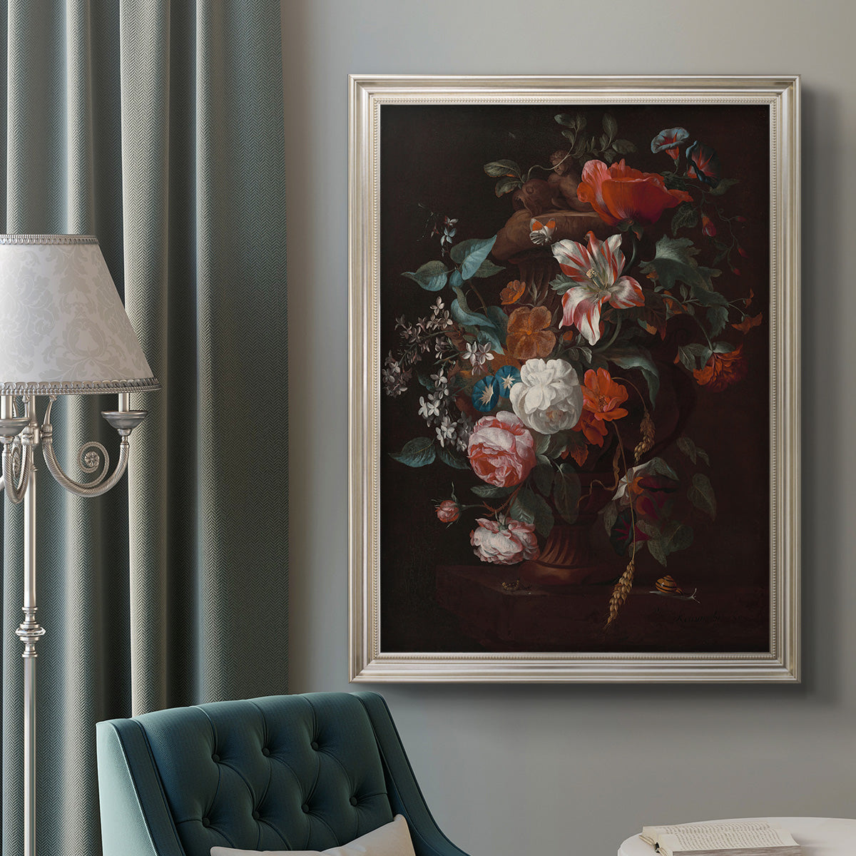 Classical floral still life painting by Jan van Huysum in an ornate champagne frame displayed in a neutral interior setting.