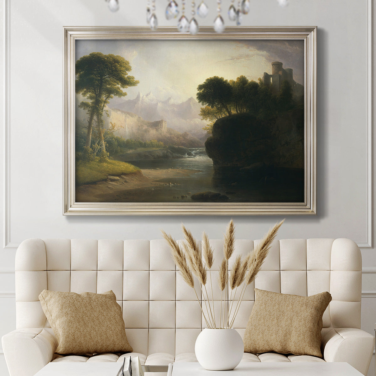 Romantic autumn landscape along the Hudson River by Thomas Doughty in an ornate champagne frame displayed in a neutral-toned interior setting.