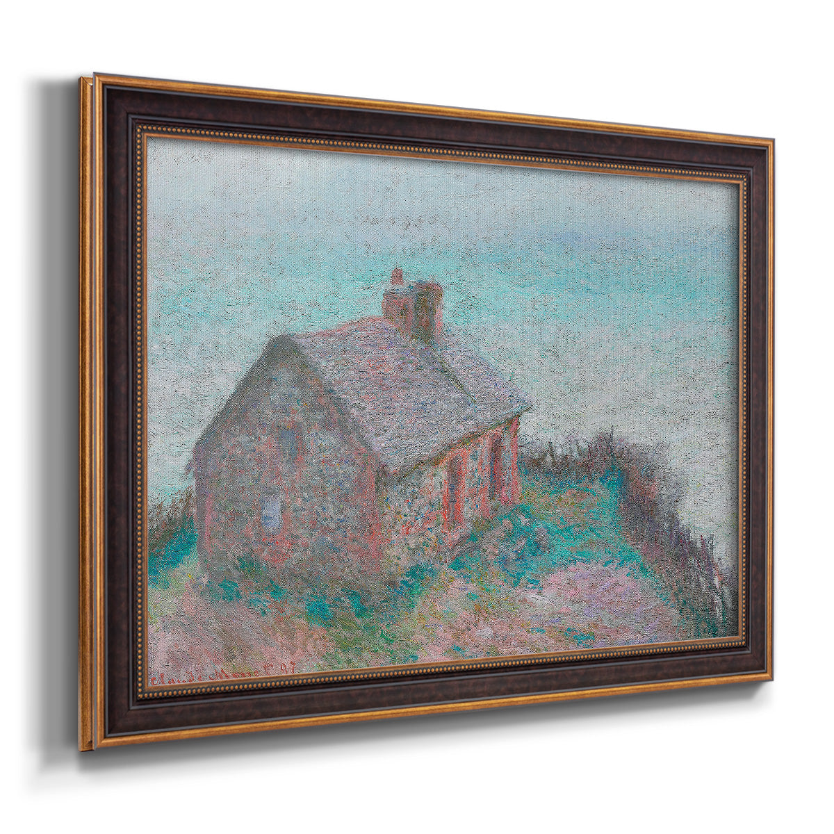 Impressionist coastal building landscape by Claude Monet printed on canvas in an ornate bronzed mahogany wood frame.
