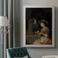 Classical interior scene of a woman weaving flowers by Godfried Schalcken in an ornate weathered white frame displayed in a neutral interior setting.