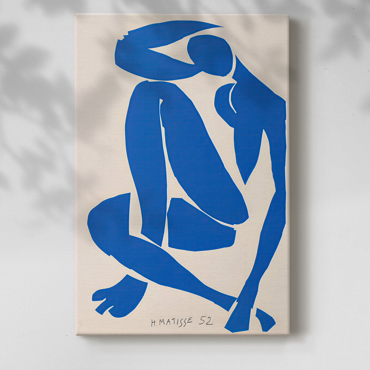 Canvas art print of a stylized body formed from flat geometric pieces in deep blue with a soft shadow on a white background.