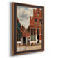 Realist city street scene by Johannes Vermeer printed on canvas in an ornate bronzed mahogany wood frame with a vertical orientation.