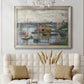 Impressionist river bridge scene on an overcast day by Claude Monet in an ornate champagne frame displayed in a neutral-toned interior setting.
