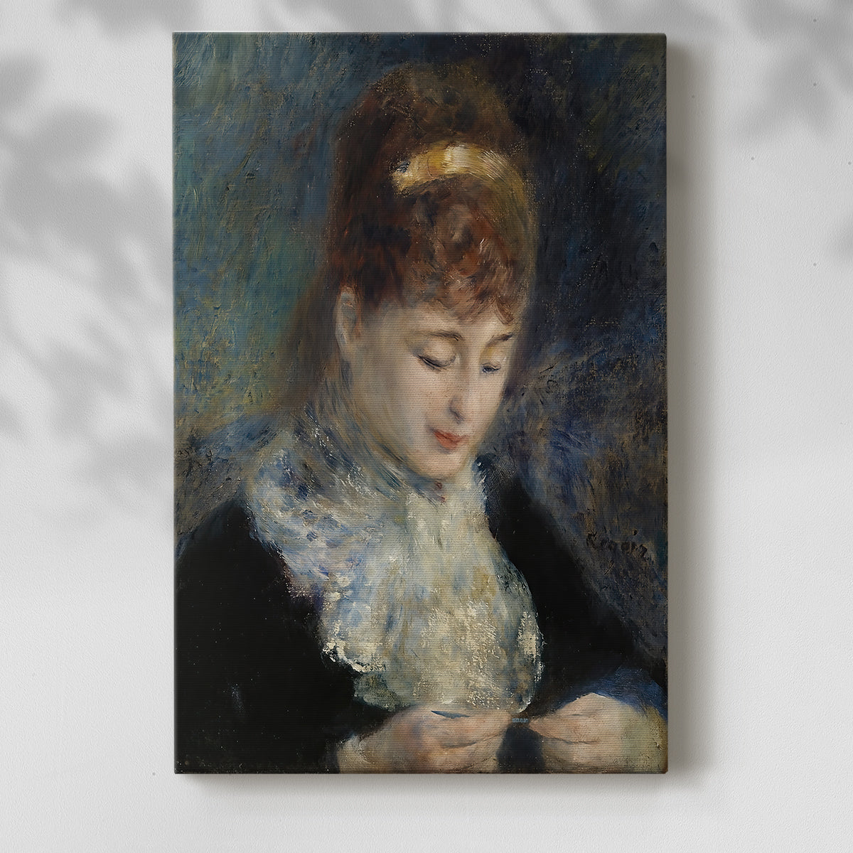 Canvas art print of a figure focused on needlework in a peaceful interior with a soft shadow on a white background.