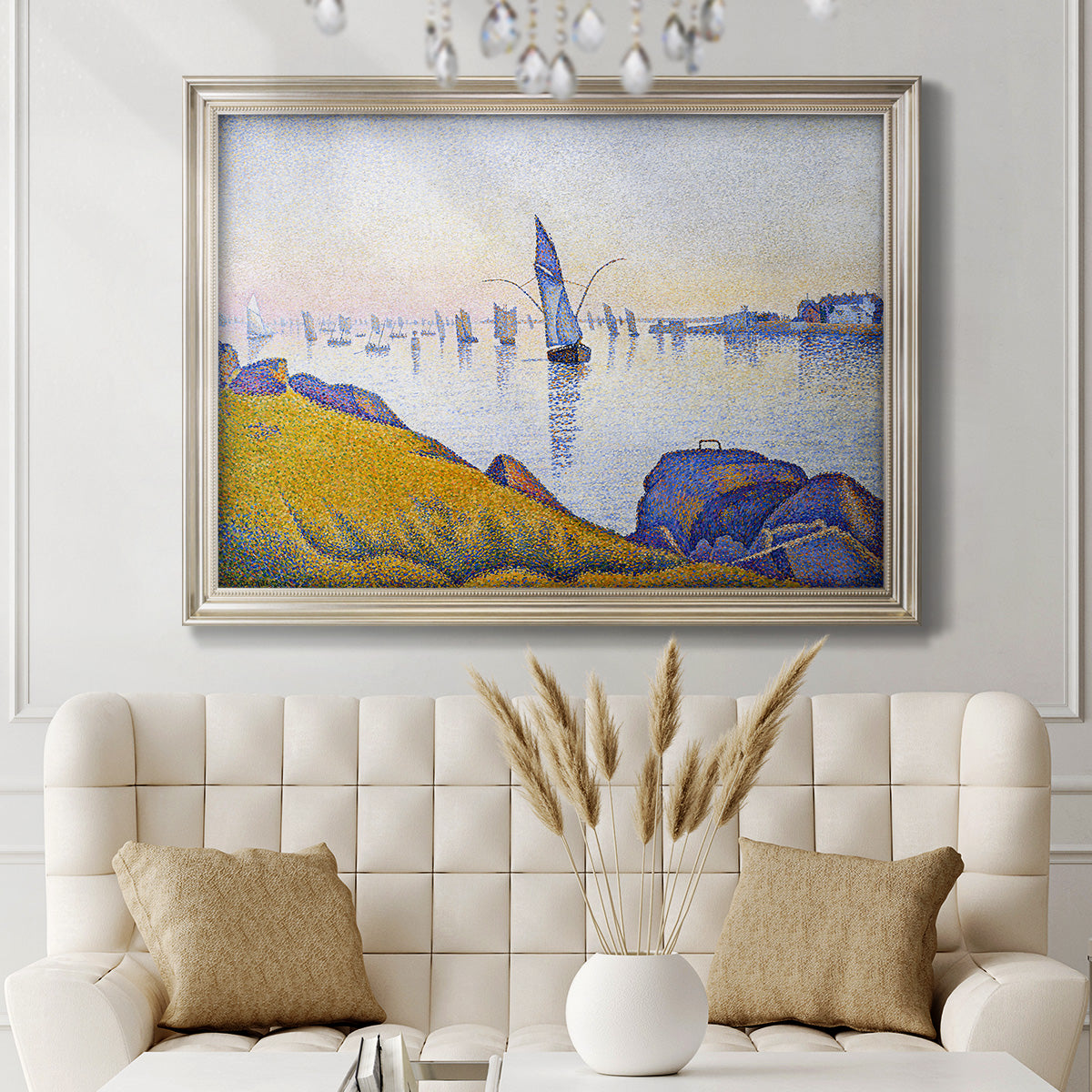 Impressionist coastal harbor at dusk by Paul Signac in an ornate champagne frame displayed in a neutral-toned interior setting.